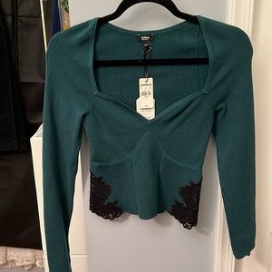 Dark green with black lacing detail.